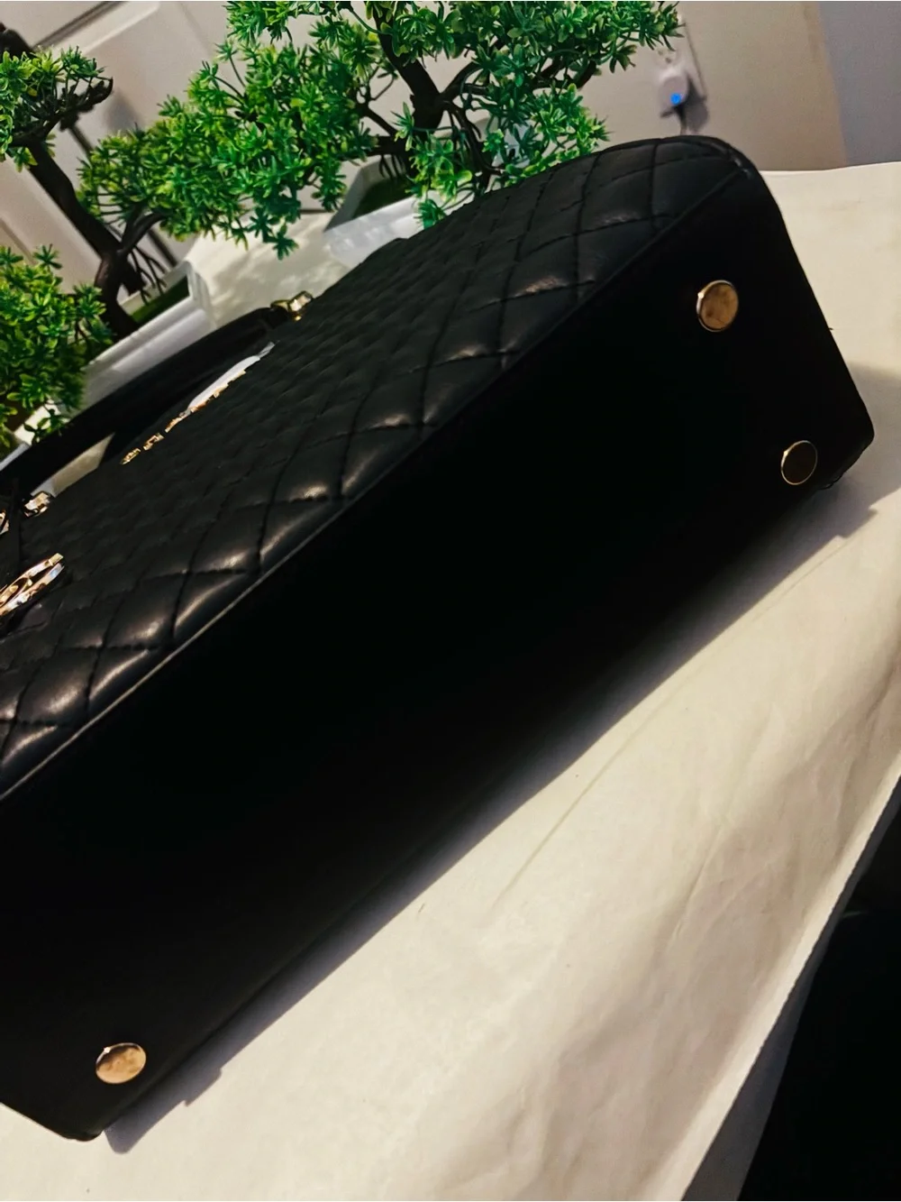 Black Quilted Top-Handle Tote with Gold Hardware